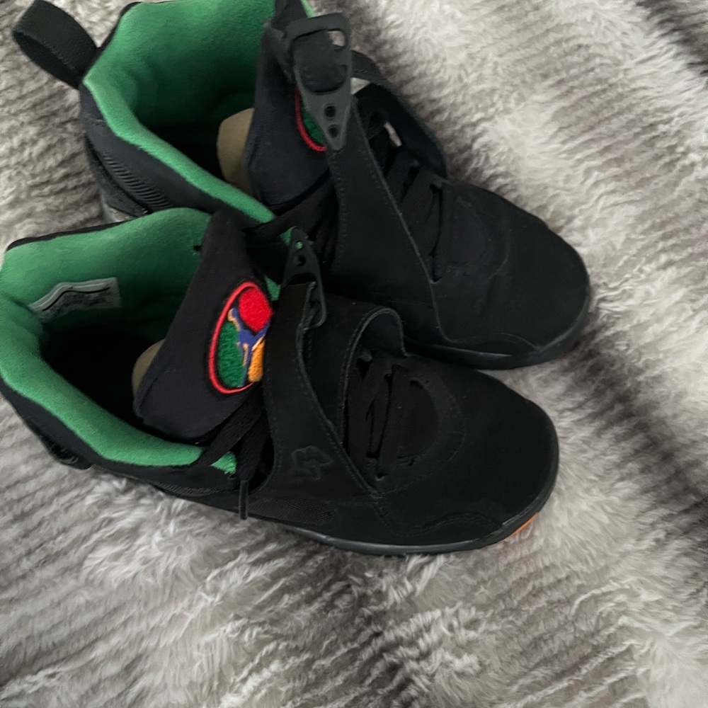 Jordan Black and Green Sneakers with Skateboarding Design